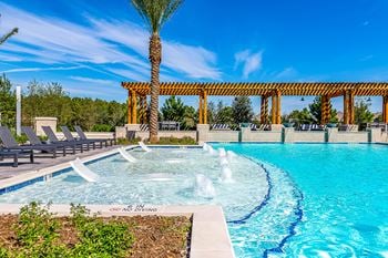 Resort-style pool with tanning ledge